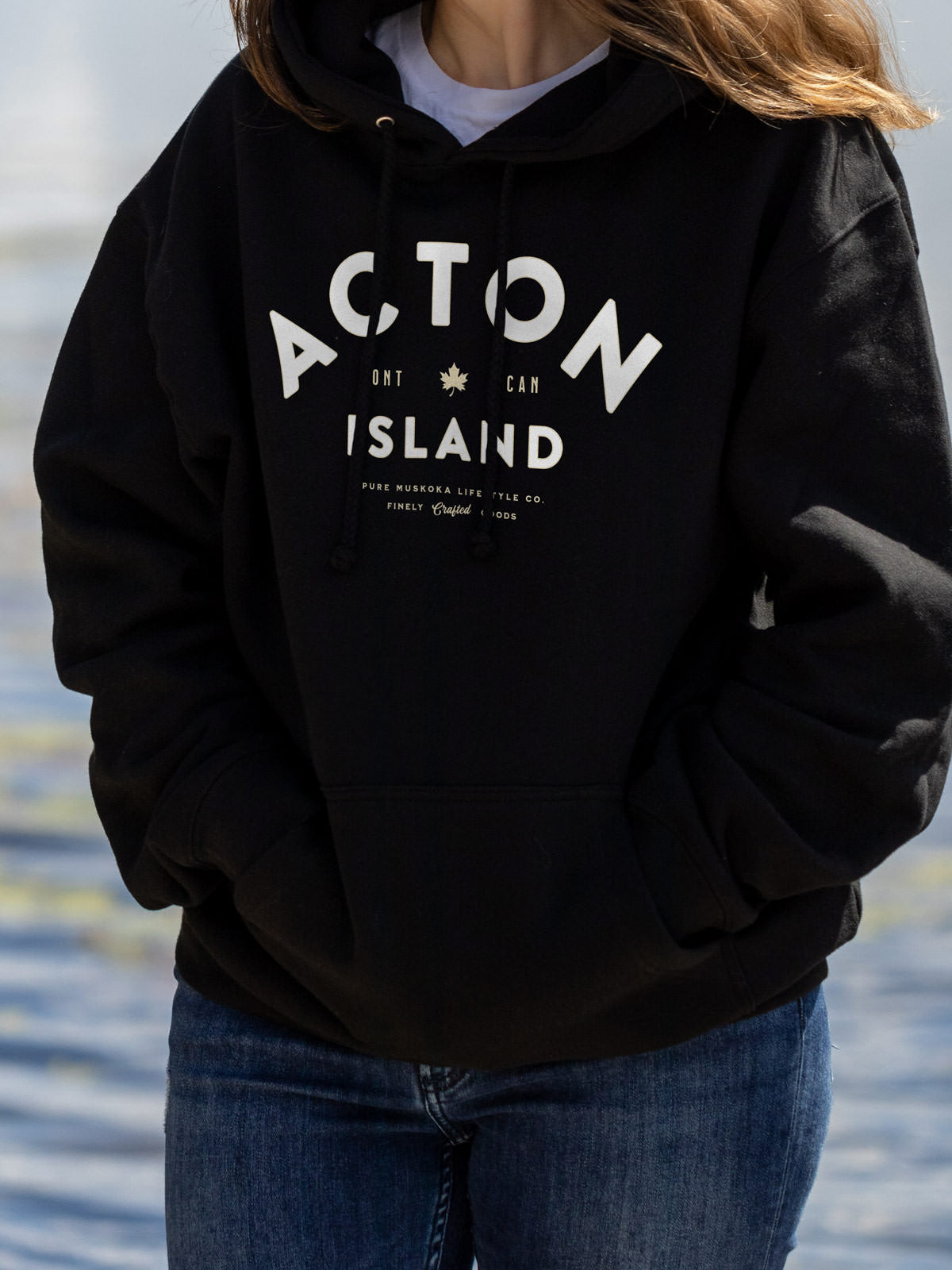 Acton Island unisex hoodie in Black - Pure Muskoka - Female Model