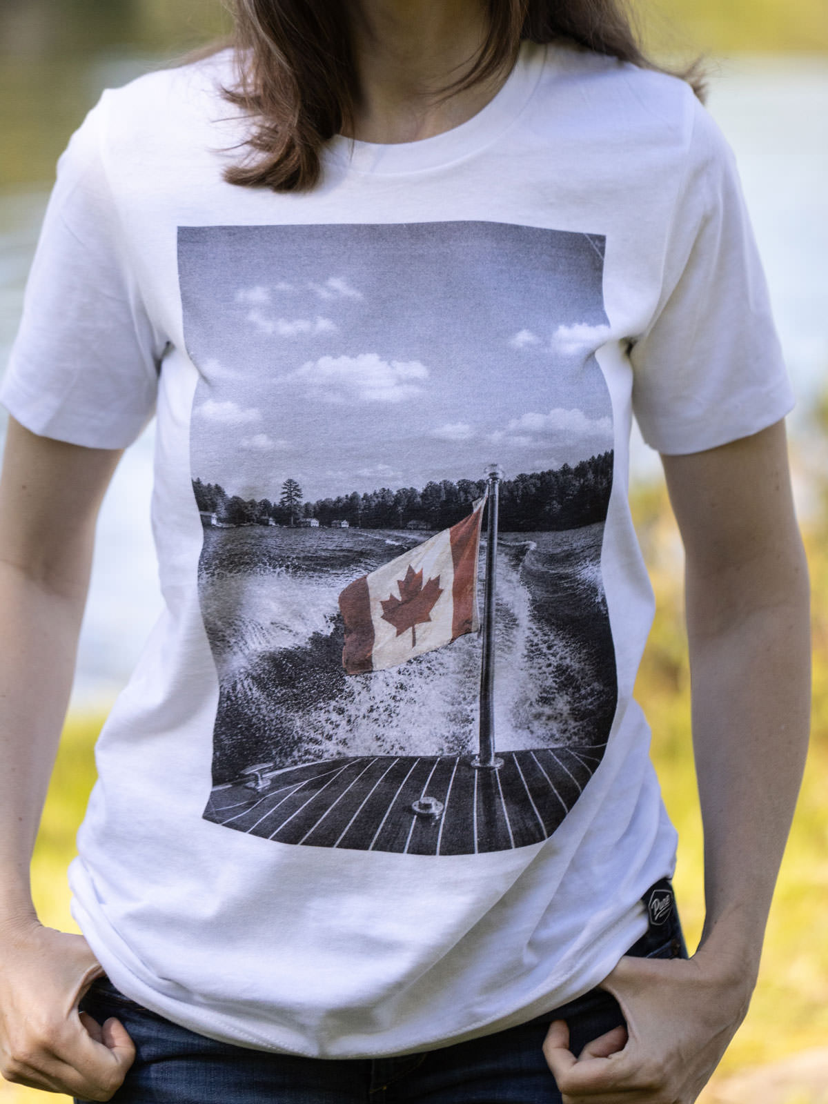 The Boat Flag - Canada Day T-Shirt - Female Model - Pure Muskoka