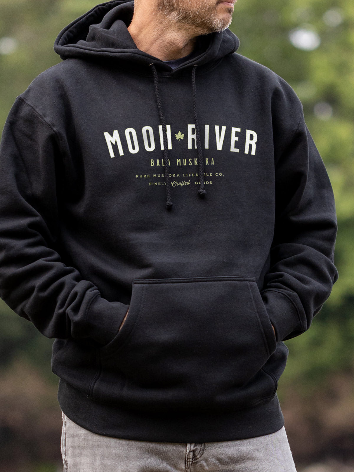 Moon River unisex hoodie in Black - Pure Muskoka - Male Model
