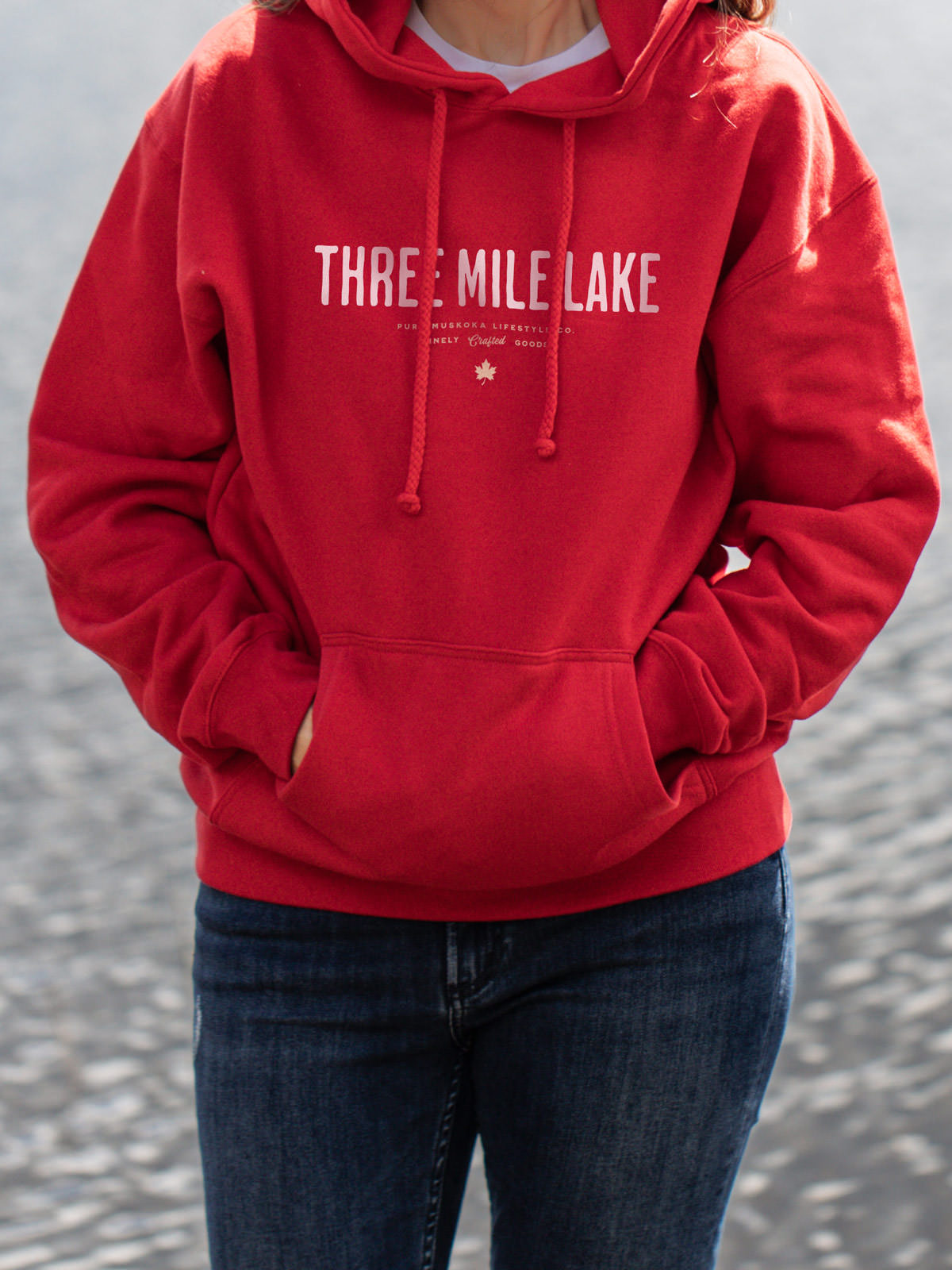 Three Mile Lake unisex hoodie in Red - Pure Muskoka - Female Model