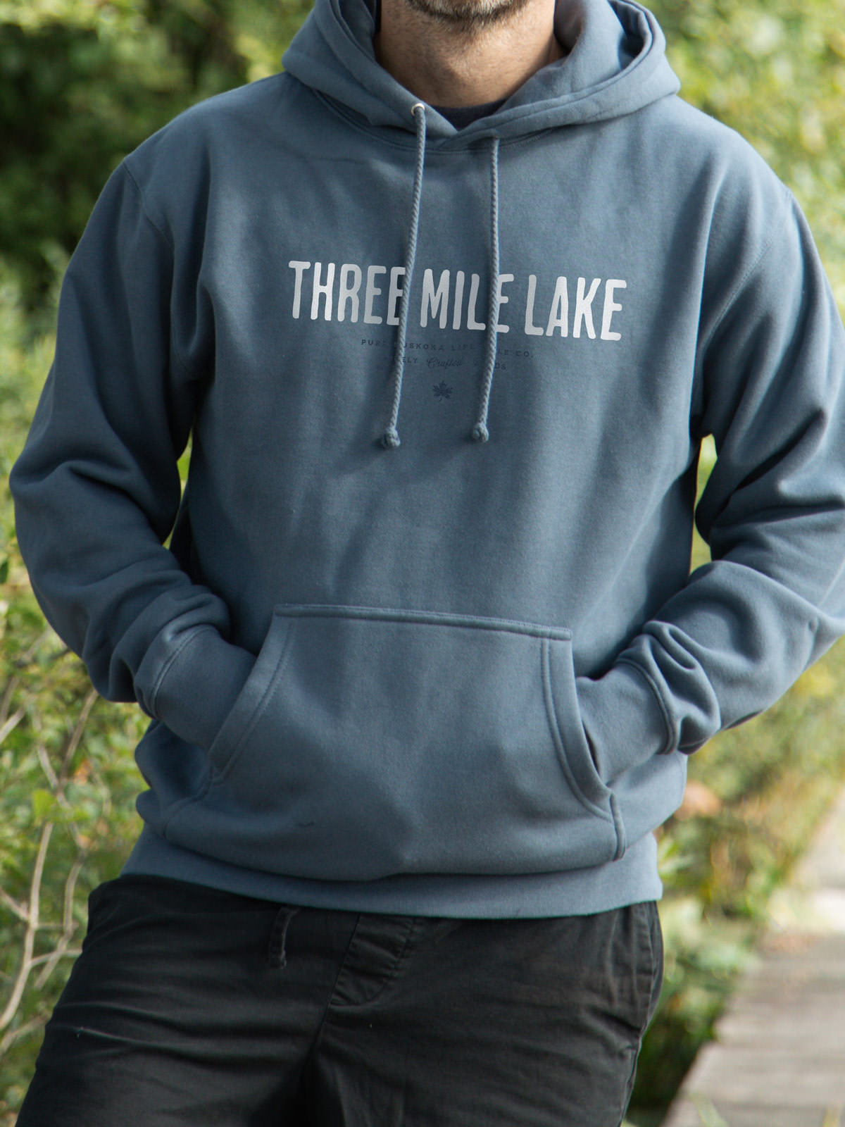 Three Mile Lake unisex hoodie in Storm Blue - Pure Muskoka - Male Model